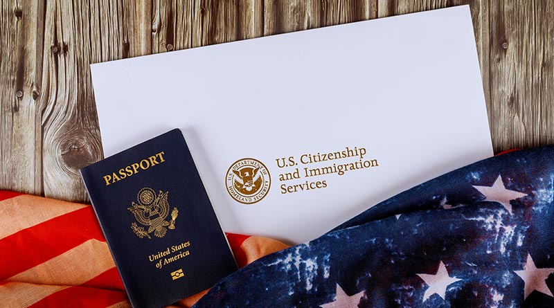 pasaporte-y-bandera-americana