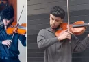 Violinista cubano en España tocando en la calle de Oviedo.